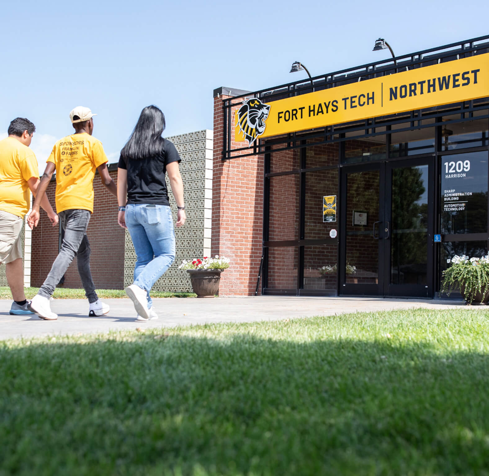 Students walking to the front entrance